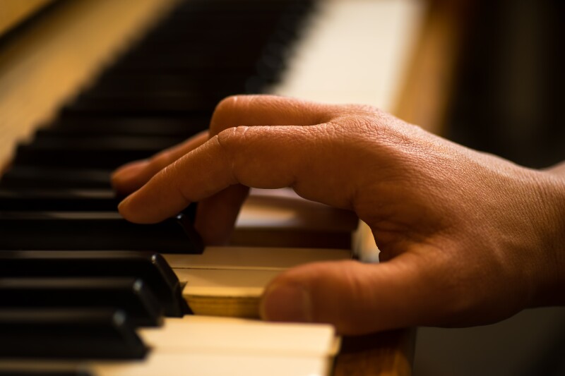 Hand,Playing,Upright,Piano,,Shallow,Depth,Of,Field,Shot,With