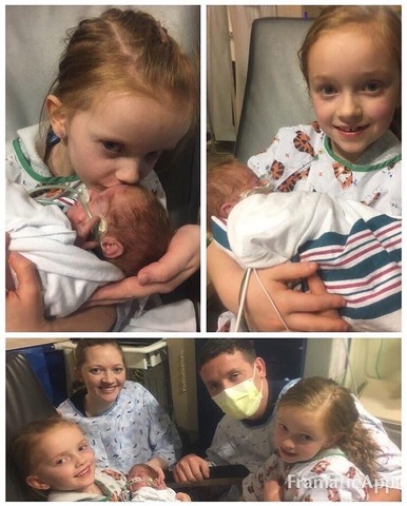 Carissa and family with her son in the NICU on Christmas. That day was the first time Carissa's young daughters were able to hold their baby brother.