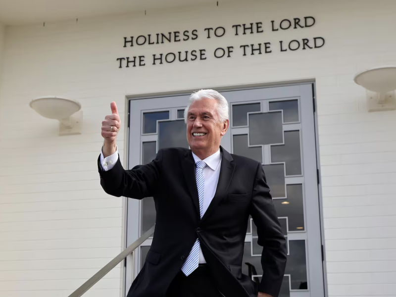 Elder Dieter F. Uchtdorf gives a thumbs up to a crowd after the final session of the rededication of the Hamilton New Zealand Temple in Hamilton, New Zealand, on Sunday, Oct. 16, 2022.