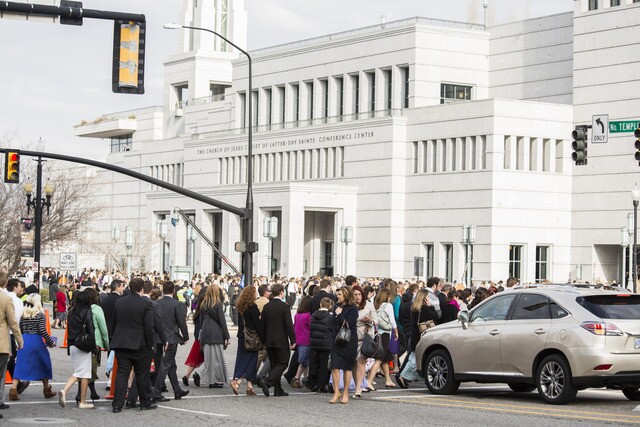 Crowds walk into the Conference Center