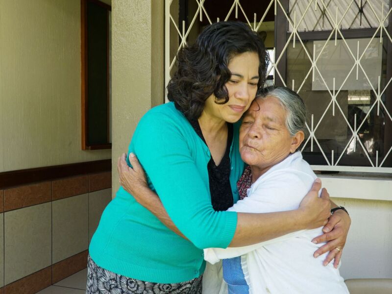 Reyna Aburto hugs a sister in Guatemala.jpeg