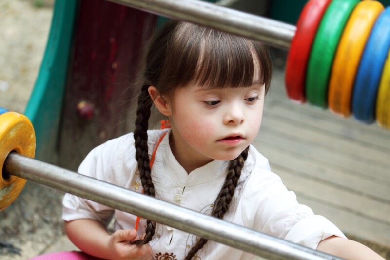 Portrait,Of,Beautiful,Young,Girl,On,The,Playground.