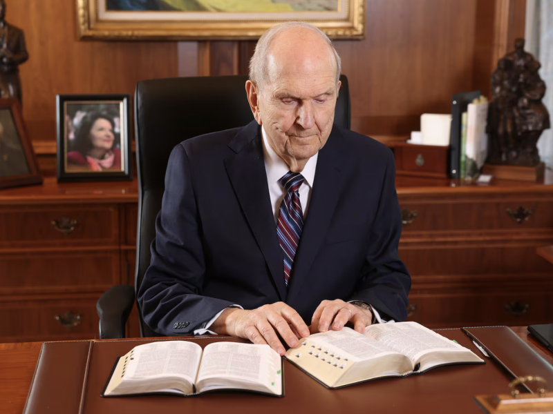 President Russell M. Nelson of The Church of Jesus Christ of Latter-day Saints reads scripture in his office in the Church Administration Building in Salt Lake City on Wednesday, April 13, 2022.