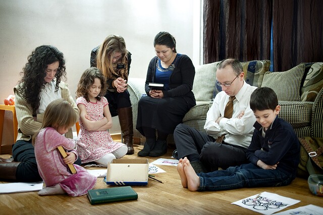 Family Praying Featured on National Geographic