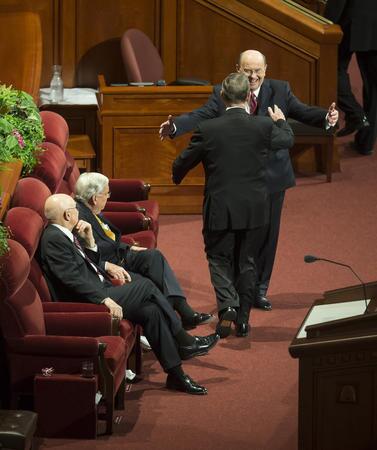 Image titleElder Cook and Elder Holland. Image from Deseret News.