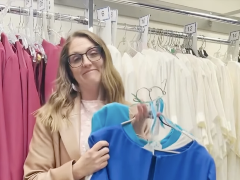 Jenna Barson holds her mother’s dresses that she inherited for The Tabernacle Choir.