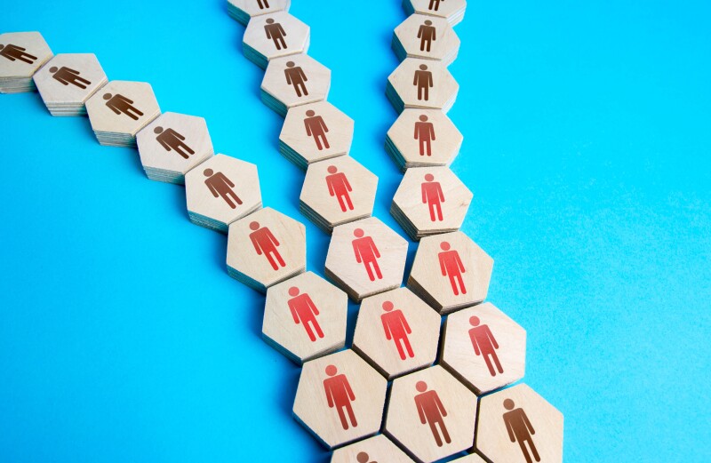 People separating into smaller groups away from each other.