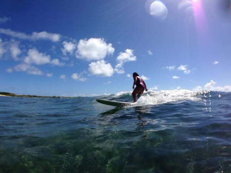 Miya surfing.