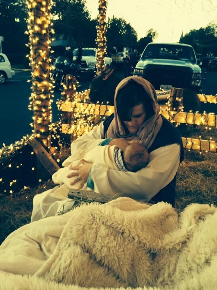 Inside the float, Jessica Weirich posing as Mary.
