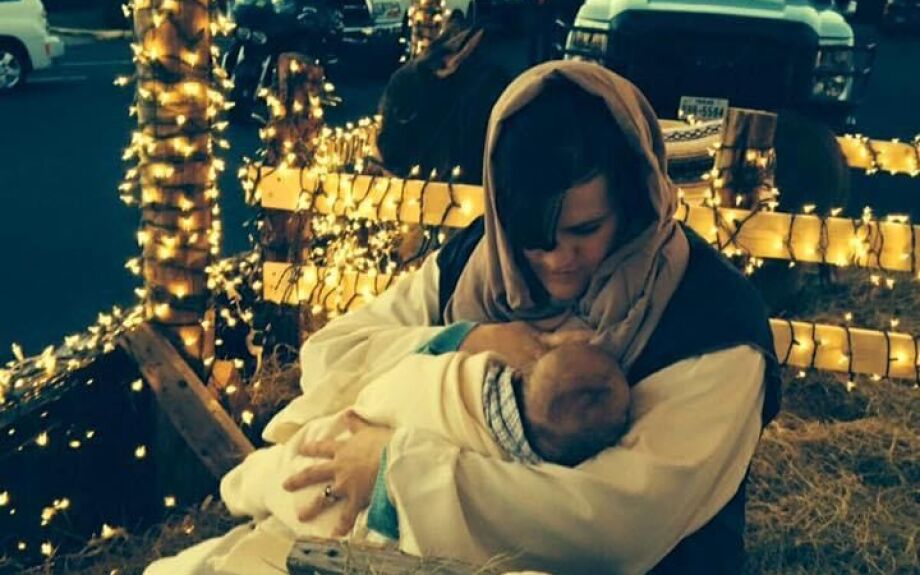 Inside the float, Jessica Weirich posing as Mary.