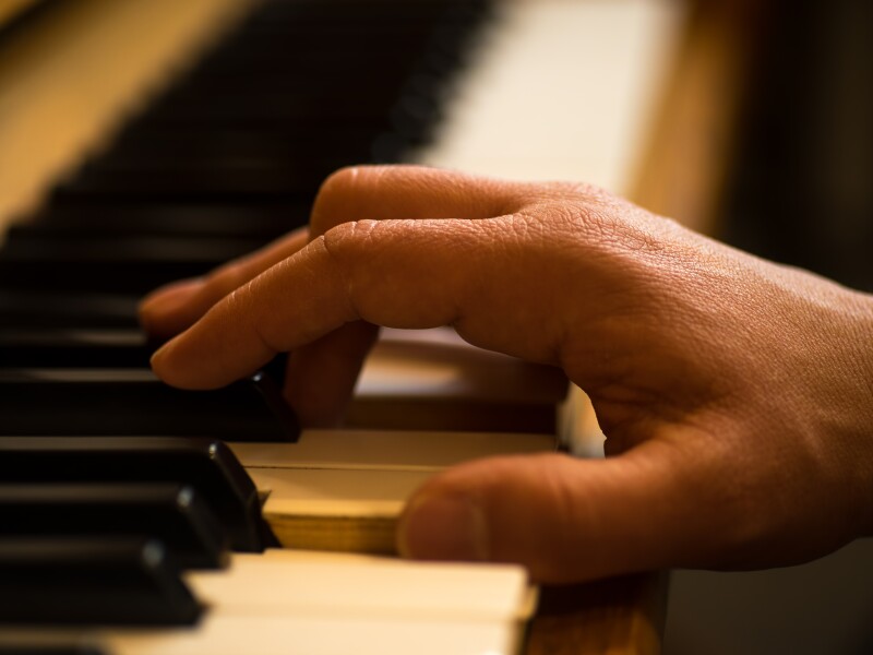Hand,Playing,Upright,Piano,,Shallow,Depth,Of,Field,Shot,With