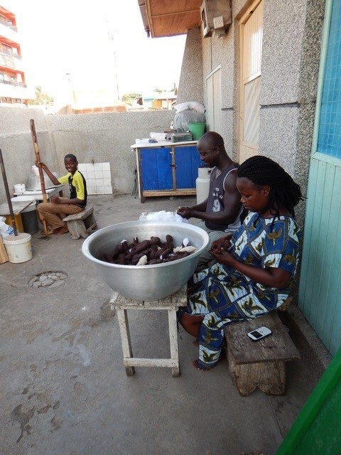 Family members in Ghana working on nativities.jpg