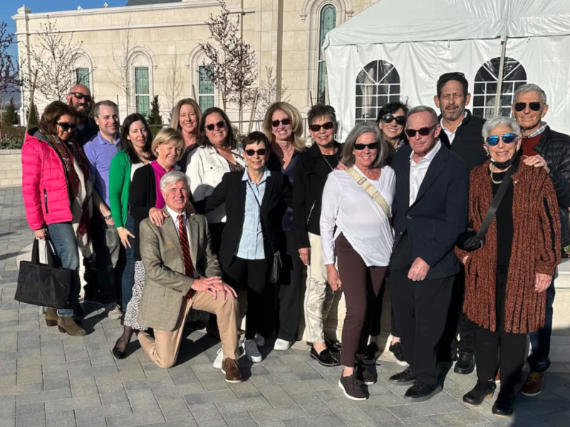 A United Jewish Federation of Utah tour group poses outside the Taylorsville Utah Temple on Monday, April 15, 2024. The group sang Psalm 133 in Hebrew with Latter-day Saint friends at the end of the tour.