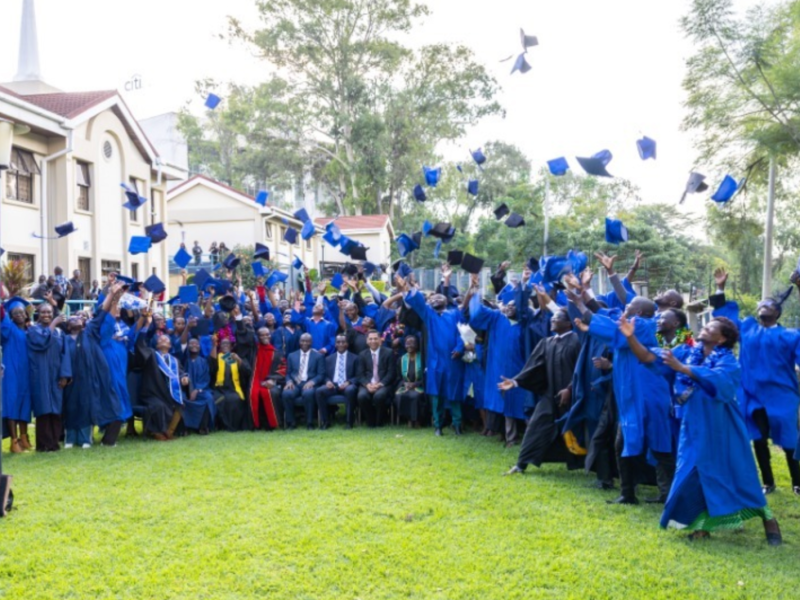 Graduates throw their caps in the air in celebration following the BYU–Pathway Completion Ceremony in Nairobi, Kenya. April 25, 2026.