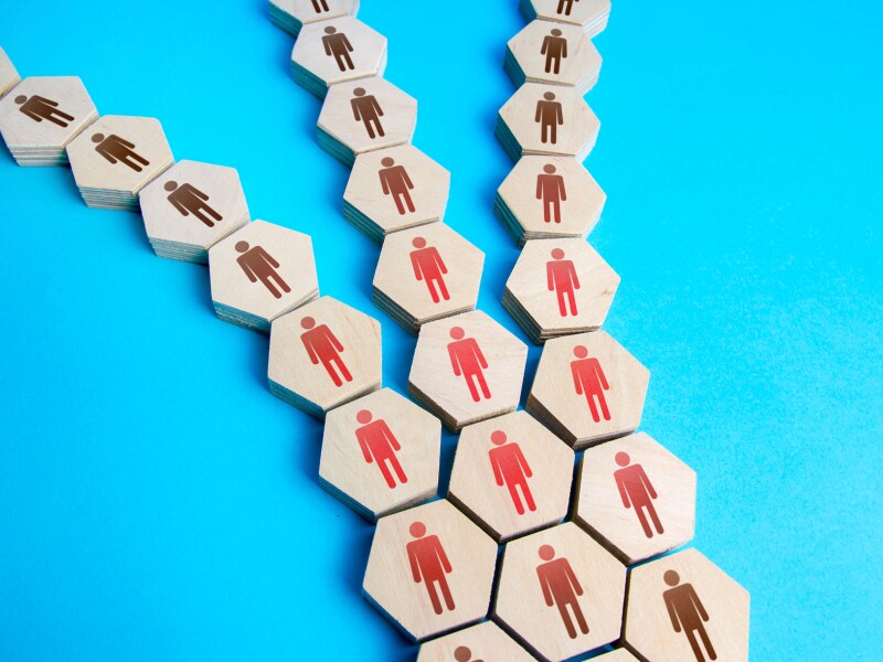 People separating into smaller groups away from each other.