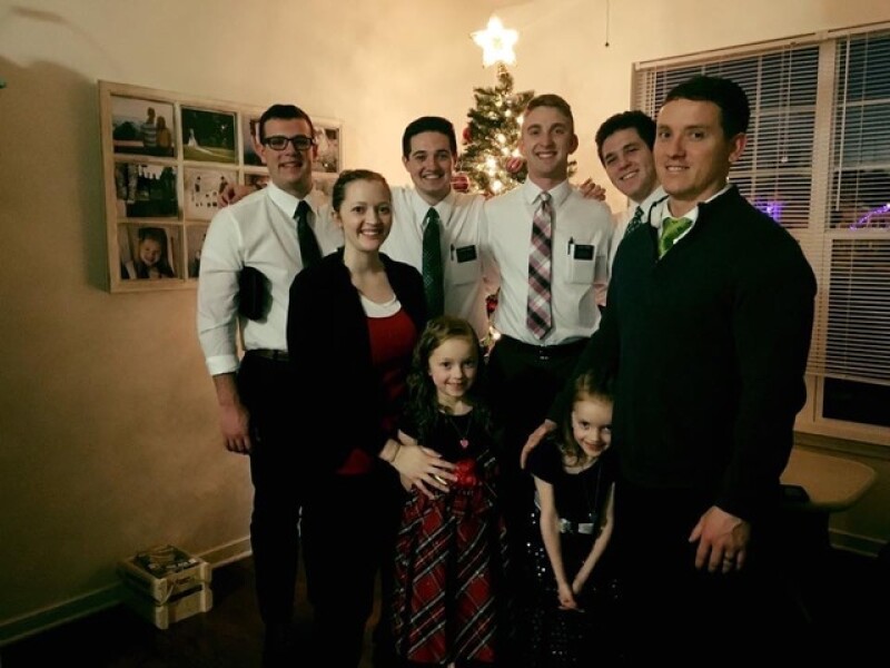 Carissa and her family with the missionaries at Christmas. While her son was in the NICU, Carissa felt prompted to help these missionaries connect with their families on Christmas Day.