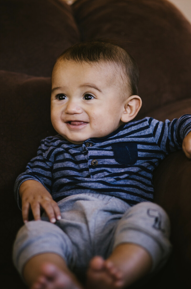 A portrait of a baby boy smiling