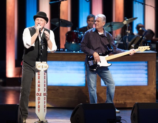 Collin Raye and Kevin Guest performing for the Grand Ole Opry.