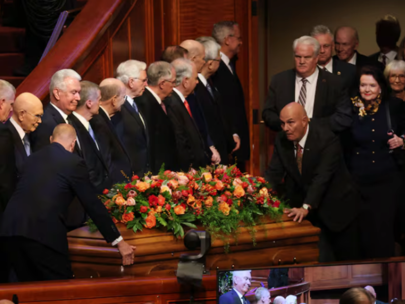 Apostles stand as the casket of President Russell M. Nelson of The Church of Jesus Christ of Latter-day Saints is brought in during funeral services at the Conference Center in Salt Lake City on Tuesday, Oct. 7, 2025.