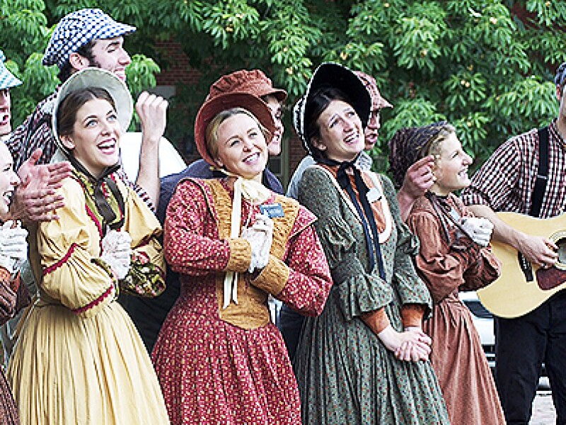 Young performing missionaries singing in Nauvoo