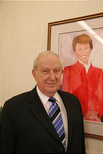 Elder Richard G. Scott in front of his painting of his wife, Jeanene