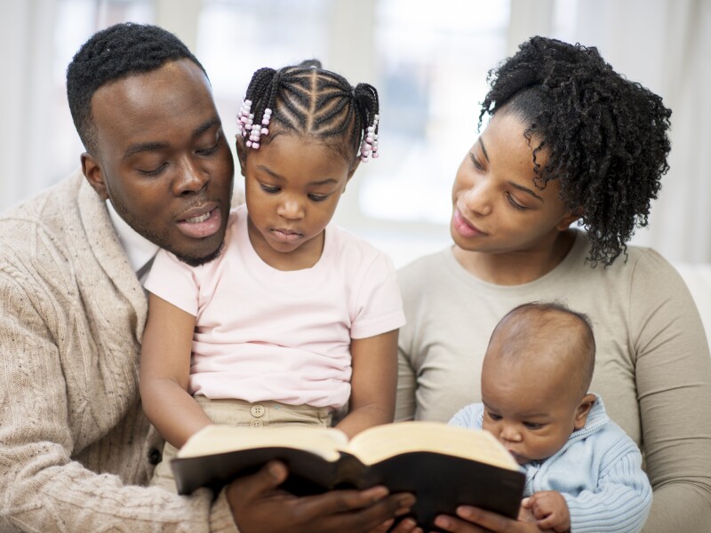 Family Reading the Bible Together