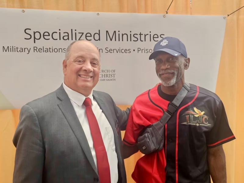 Elder Timothy Fagan with a veteran athlete at the 2026 National Veterans Golden Age Games