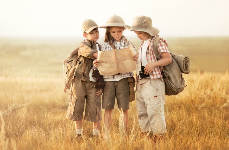 shutterstock_211599823_children_exploring_map_journey.jpg