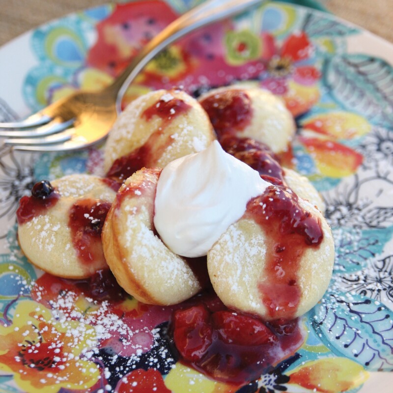 Mini Puffed Oven Pancakes with Berry Sauce | 20 Breakfast Recipes Perfect for Christmas Morning from LDS Living