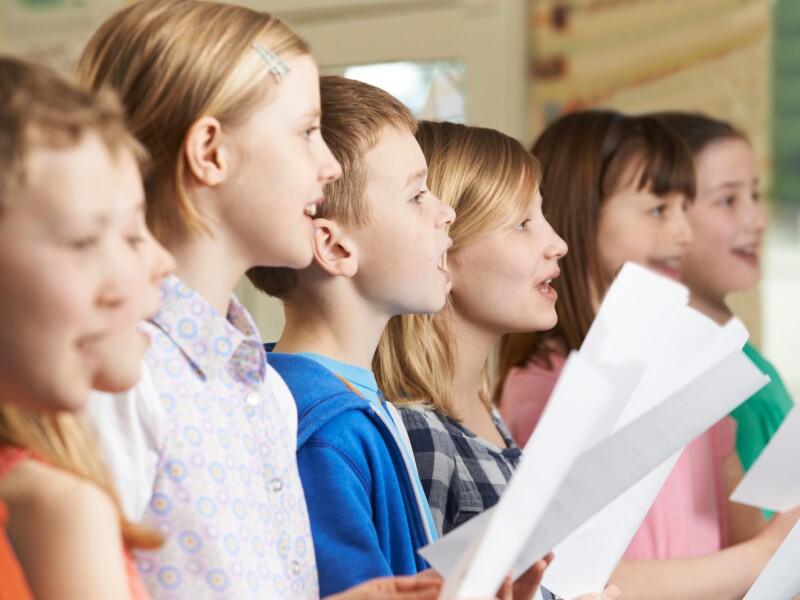 Group,Of,School,Children,Singing,In,School,Choir