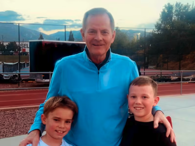 Elder Gary E. Stevenson of the Quorum of the Twelve Apostles poses for a photo with 9-year-old Garrett Rawlins, left, and 9-year-old Bo Burtenshaw, right. Both boys are in the Syracuse Utah West Stake and met Elder Stevenson at a high school football game in northern Utah on Friday, Oct. 4, 2024.