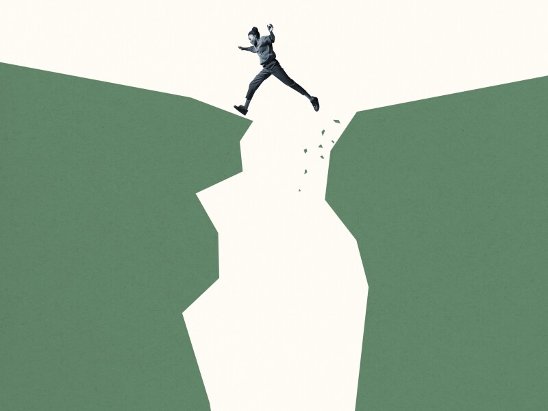 Young woman jumping over green cliffs