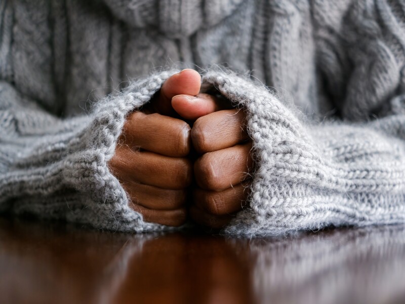 Close-Up of Woman's Hands on Table