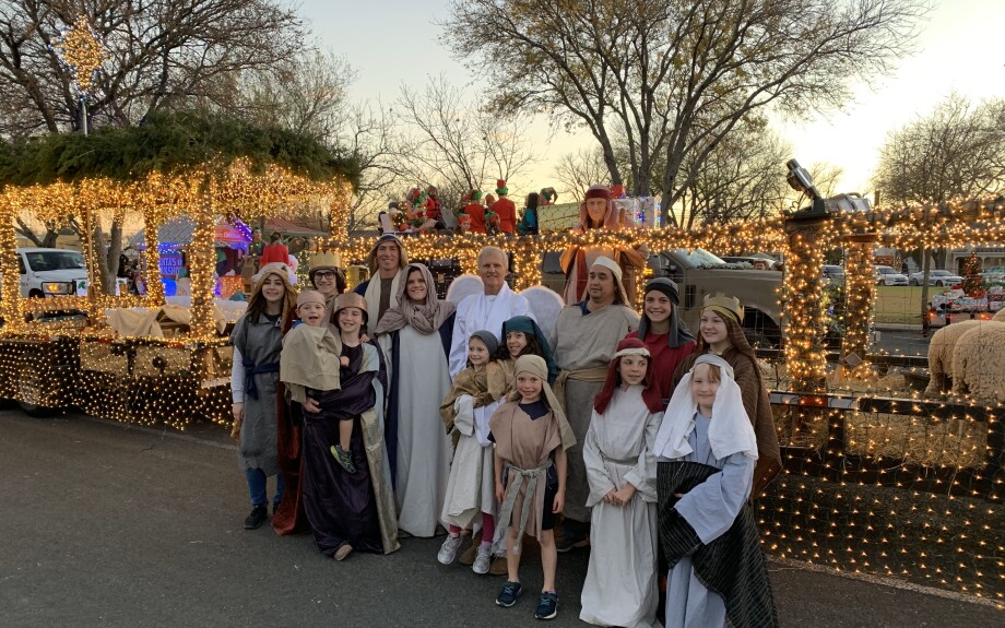 Fredericksburg branch members pose as actors for the float.