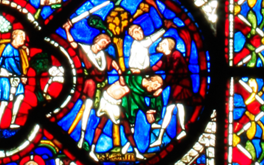 The parable of the Good Samaritan as depicted in the Chartres Cathedral stained glass windows