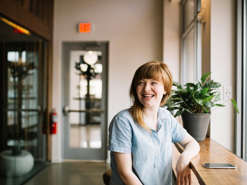 woman smiling at friend.jpg