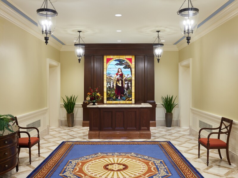 The foyer and a stained glass art piece inside the Richmond Virginia Temple.