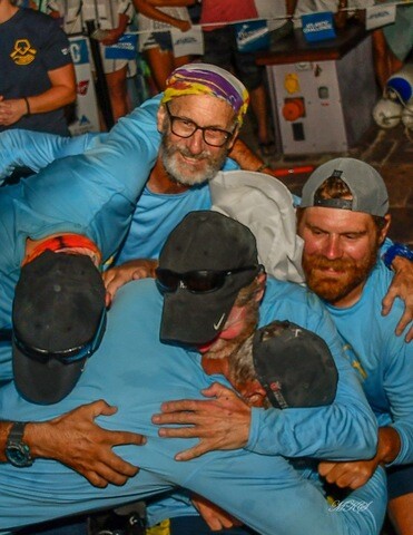 The Row4ALS team hugging after they finished the Atlantic Challenge