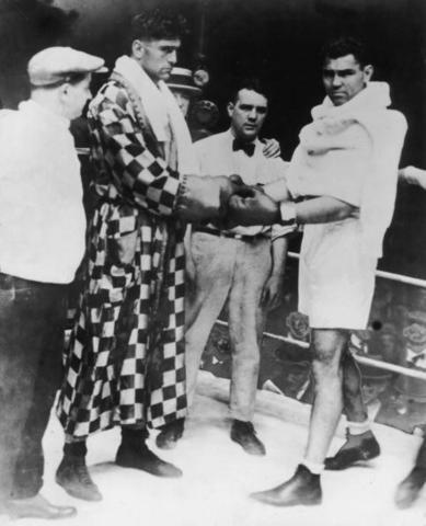 American world heavyweight champion boxer Jack Dempsey (1895-1983) with Argentine heavyweight champion Luis Angel Firpo (left) before their match at the Polo Grounds in New York, September 14, 1923. Dempsey won with a knockout after a bout lasting only 3 minutes and 57 seconds. (Photo by Hulton Archive/Getty Images)