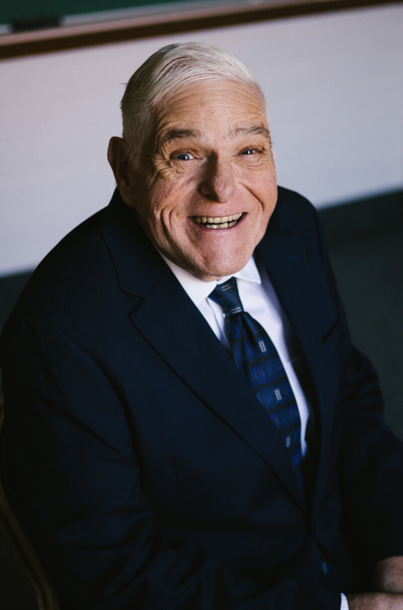 A portrait of a man smiling