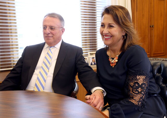 Elder and Sister Soares holding hands