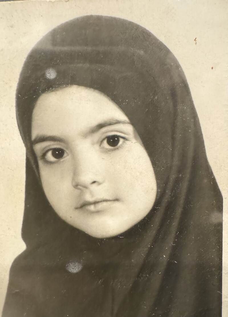 Shima's childhood passport picture.jpg
