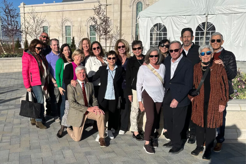 A United Jewish Federation of Utah tour group poses outside the Taylorsville Utah Temple on Monday, April 15, 2024. The group sang Psalm 133 in Hebrew with Latter-day Saint friends at the end of the tour.