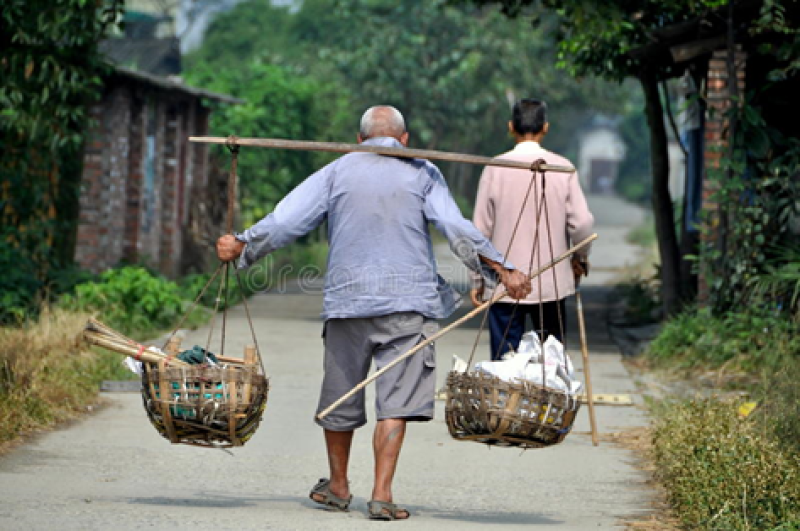 man-carrying-baskets.png