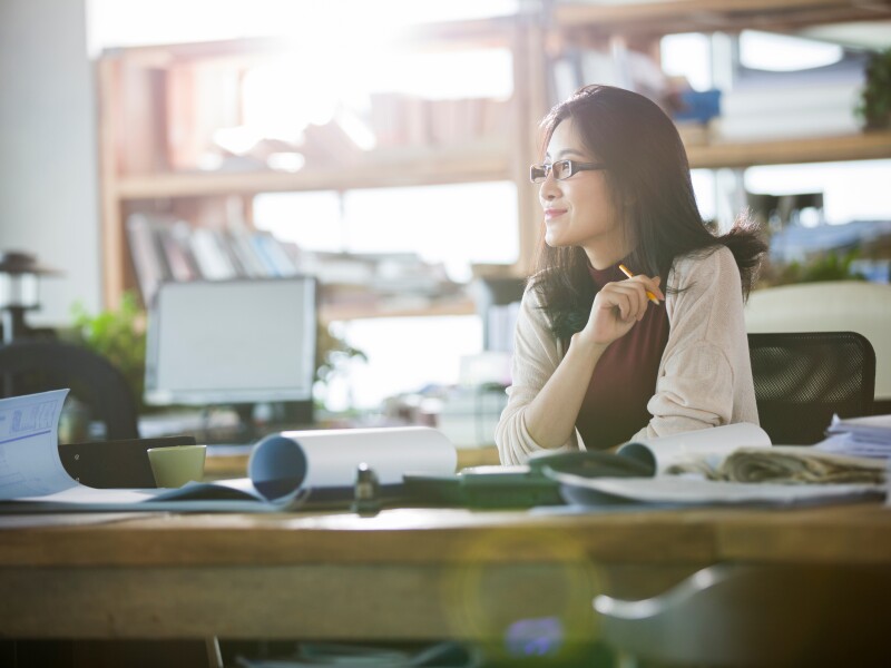 Female Chinese architect working in the office