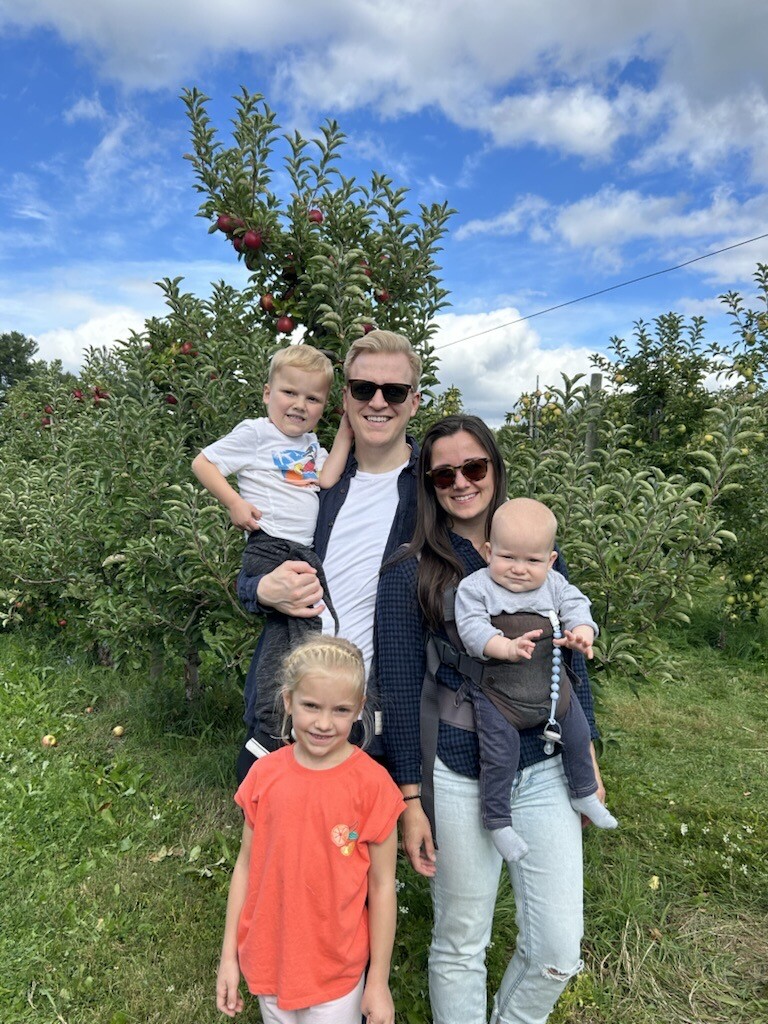 Caitlin Bekker with her husband and three children.