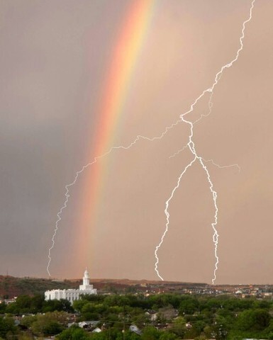 St. George Utah Temple with rainbow and lightning