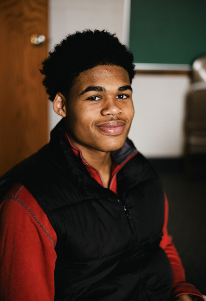 A portrait of a young man smiling
