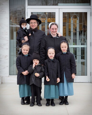 The Weaver family outside a temple of The Church of Jesus Christ of Latter-day Saints.