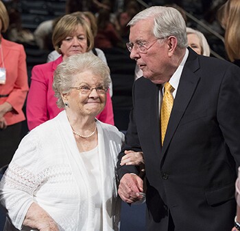 Elder and Sister Ballard walking together